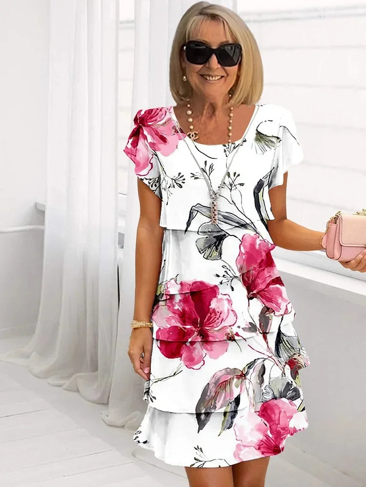 Frida - Sommarklänning med lekfullt blommiga lager