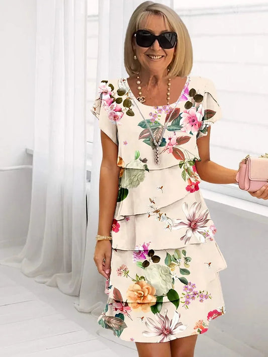 Frida - Sommarklänning med lekfullt blommiga lager